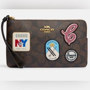 Coach CF457 Large Corner Zip Wristlet In Signature Canvas With Ski Patches